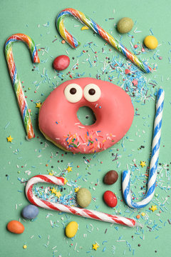 Pink funny surprised donut