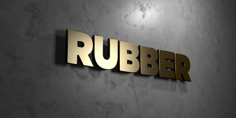 Rubber - Gold sign mounted on glossy marble wall  - 3D rendered royalty free stock illustration. This image can be used for an online website banner ad or a print postcard.