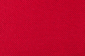 Red background  of fabric, one color,  texture of the material