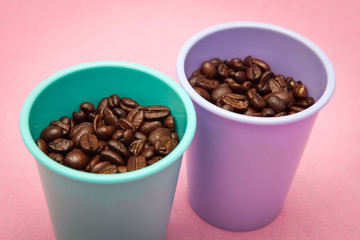coffee beans on pink backgrounds