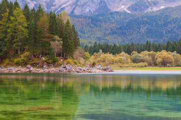 Beautiful Lago di Fusine the mountain lake and Mangart mountain