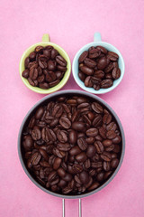 coffee beans on pink backgrounds