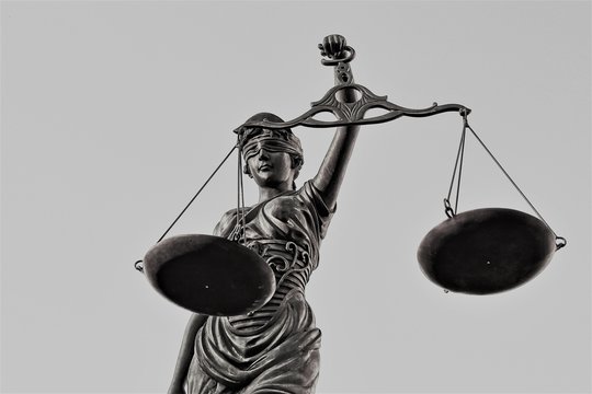 Justitia poetic justice