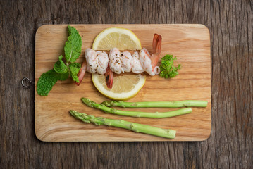FoodShrimps. Prawns on a wood Background .Seafood