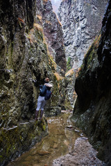 Woman hiker in a canyon