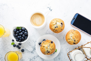 Bright and airy breakfast with blueberry muffin