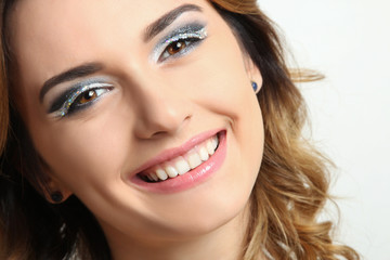 Portrait of a beautiful girl on a white background 