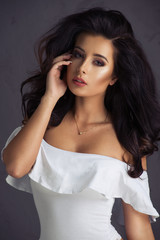 Fototapeta premium Brunette sexy woman looking at camera.