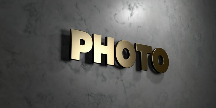 Photo - Gold sign mounted on glossy marble wall  - 3D rendered royalty free stock illustration. This image can be used for an online website banner ad or a print postcard.