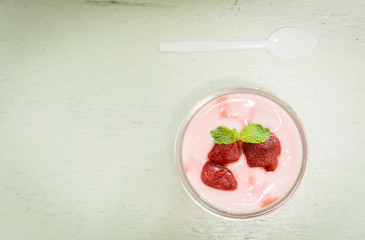 strawberry yogurt with strawberry  on wooden.
