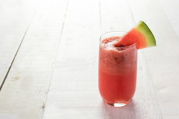 watermelon juice on wood white background