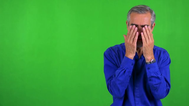 old senior man is suprised - green screen - studio