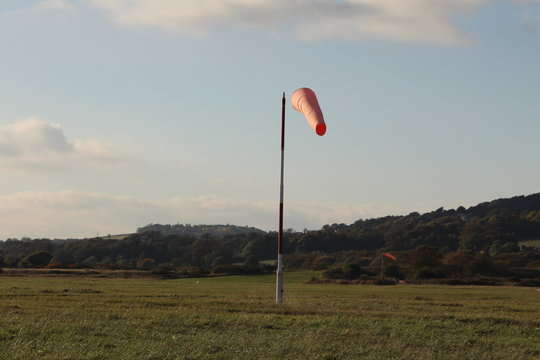 A necessary but baic invention.  The wind sock to give indication of windspeed and direction to pilots 