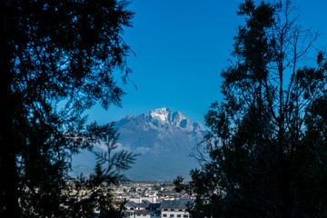 Jade Dragon Snow Mountain View from The Old Town of Lijiang, Yunnan, China.