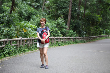 Cute Women Asian Tourist Happy on Park at Japan Country