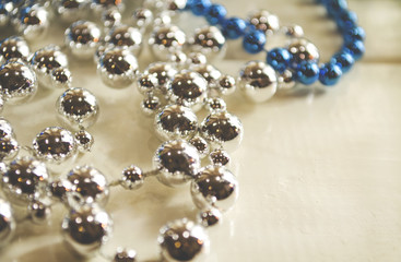 silvery and shiny beads as background