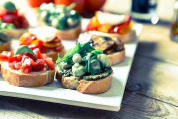 Bruschetta mit Bohnen und Rucola, Pilze, Ziegenkäse
