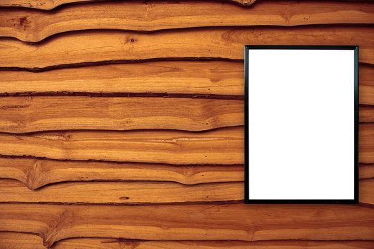 blank poster photo frame on wood wall