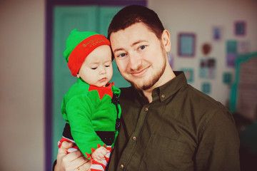 beautiful portrait of cute little boy and his happy father