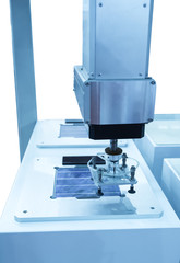 production of solar panels, Industrial robot working in factory,