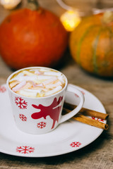 Cup of hot Chocolate drink with Marshmallows and cinnamon on dark wooden background. Winter time. Holiday concept, Selective focus