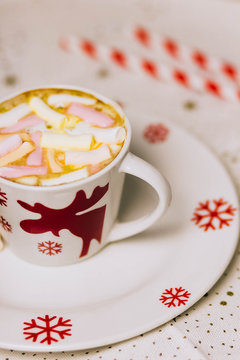 Cup of hot Chocolate drink with Marshmallows and cinnamon on dark wooden background. Winter time. Holiday concept, Selective focus