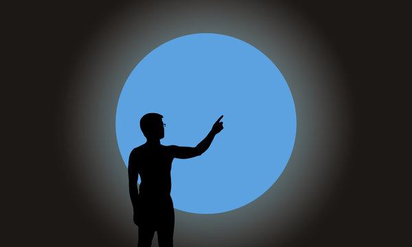Silhouette man with hand pointing on super blue full moon background