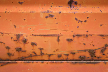 Rusty red metal background.