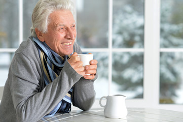 Senior man drinking tea  
