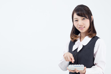 Fototapeta na wymiar Asian businesswoman on white background
