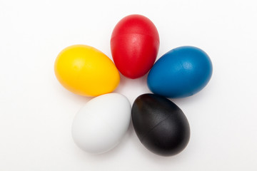 colorful toy eggs for kids play on white backgrounds