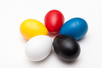 colorful toy eggs for kids play on white backgrounds