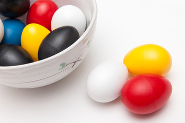 colorful toy eggs for kids play on white backgrounds