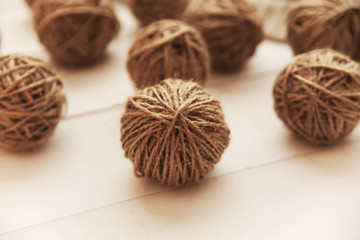 yarns for knitting on a wooden table