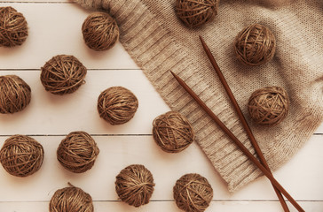 yarns for knitting on a wooden table