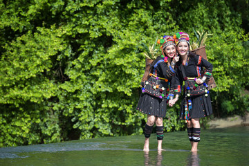 Obraz premium Hmong hill tribe people dressed in costumes, a beautiful city in Laos.