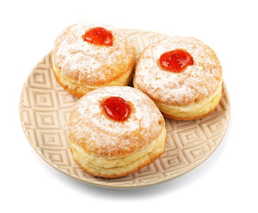 Plate with tasty donuts on white background. Hanukkah celebration concept
