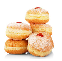 Tasty donuts with jam on white background. Hanukkah celebration concept