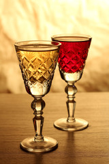 Glass and bottle wine on wooden table
