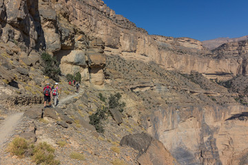 Hiking the balcony trail in Wadi Nakhr, Jabal Shams, Oman. This is the 