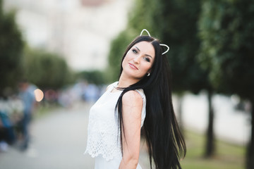 The bridesmaid with ears stand in the center of alley