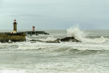 stormy dramatic marine scenery in the mouth of the river Douro in the city of Oporto in Portugal