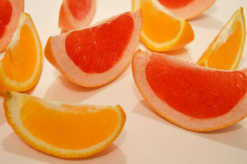 Naklejka na ściany i meble Citrus slices on a white background