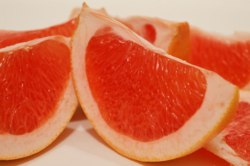 Citrus slices on a white background