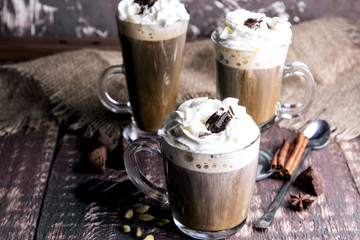 Three cup with cappuccino