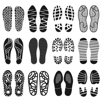 The collection of a shoeprints. Shoes silhouette black and white icons. Imprint the soles with the differing patterns. Vector eps