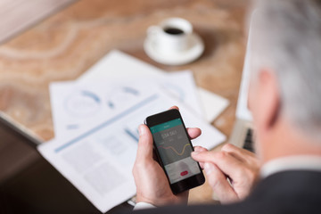 Modern mobile in hands of the businessman