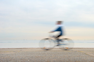 Obraz premium Bicyclist, motion blur