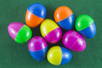 Merry Christmas and Happy New Year,Easter eggs on green background