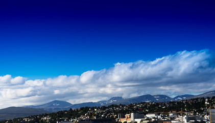 Fototapeta na wymiar Bottom aligned Norway city with top clean sky background